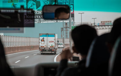 Rear view of people working