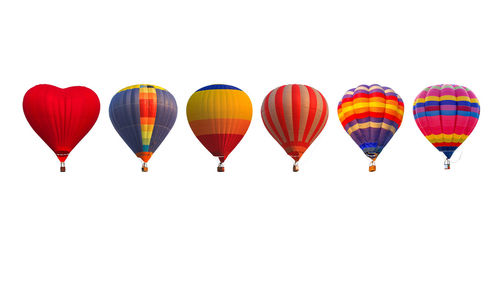 Low angle view of hot air balloons against sky