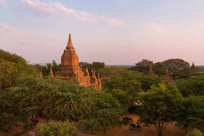 View of temple on building against sky