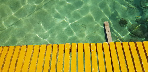 High angle view of yellow swimming pool