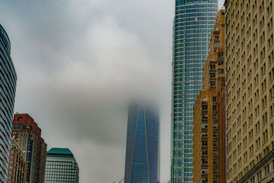 Low angle view of skyscrapers against sky