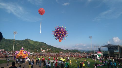 People flying over city