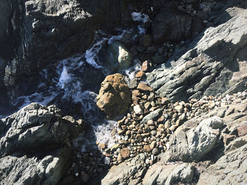 High angle view of rock formation in water