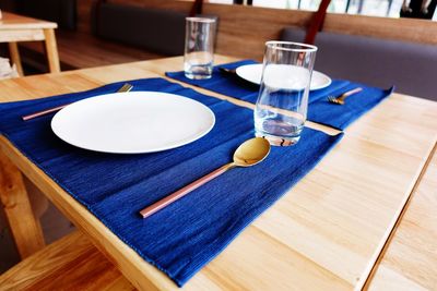 Close-up of place setting on table in restaurant