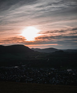 Scenic view of landscape against sky during sunset