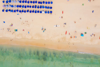 High angle view of text on sand