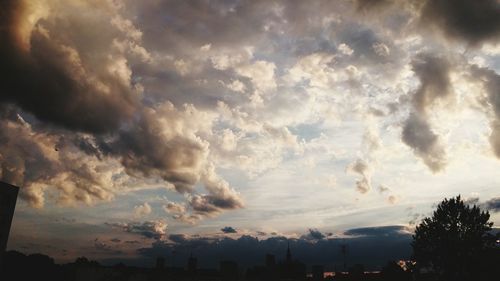 Aerial view of storm clouds over city