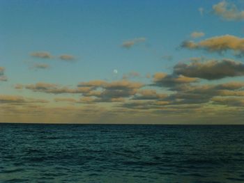 Scenic view of sea against blue sky