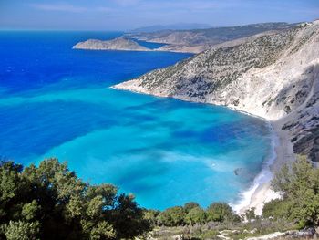 High angle view of sea against blue sky