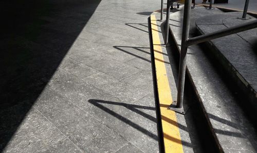 High angle view of shadow on floor