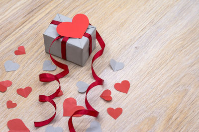 High angle view of red heart shape on table