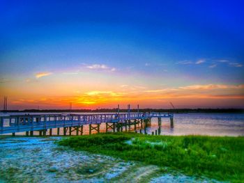 Scenic view of calm sea at sunset