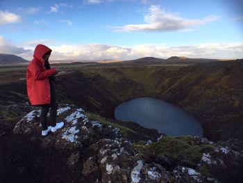 Woman standing on mountain landscape