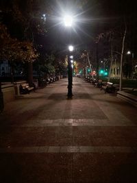 Illuminated street light at night