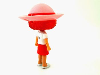 View of red toy against white background
