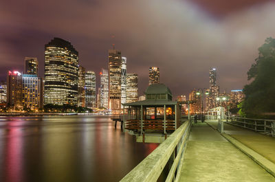 Illuminated buildings at waterfront