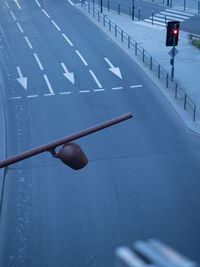 Low angle view of people walking on road