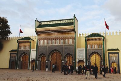 Group of people in front of building