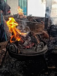 Close-up of fire on log