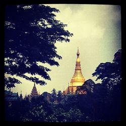 View of temple with eiffel tower in background
