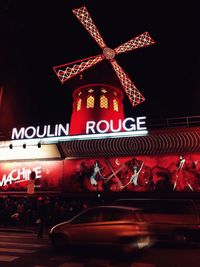 View of illuminated building in winter