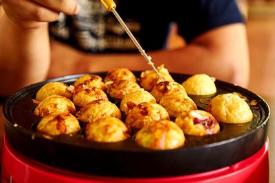 Close-up of hand holding food