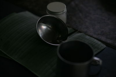 High angle view of coffee cup on table