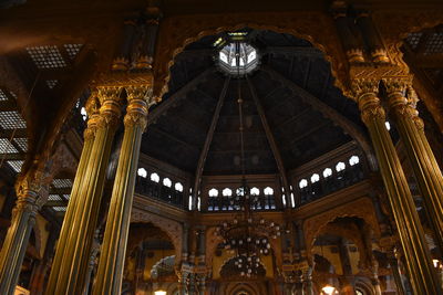 Low angle view of illuminated ceiling of building