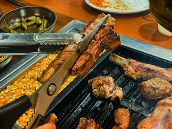 High angle view of food on barbecue grill