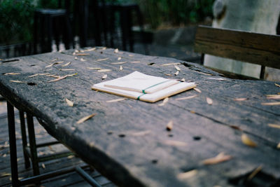 High angle view of books on wooden table