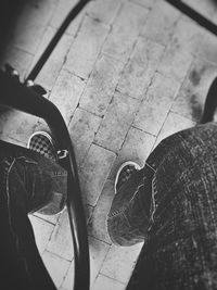 Low section of woman legs in car