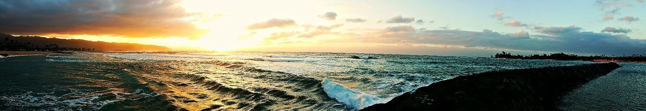 Scenic view of sea at sunset