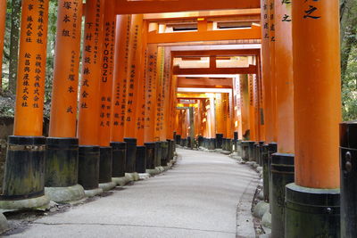 Footpath amidst buildings at temple