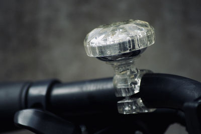 Close-up of glass bottle on table