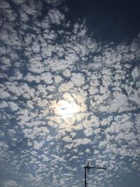 Low angle view of street light against sky