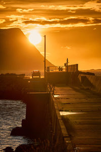 Sunset walk on the pier at flø, ulsteinvik, norway.