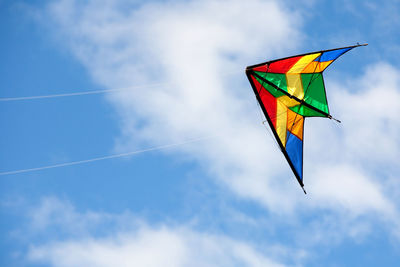 Low angle view of flag against sky