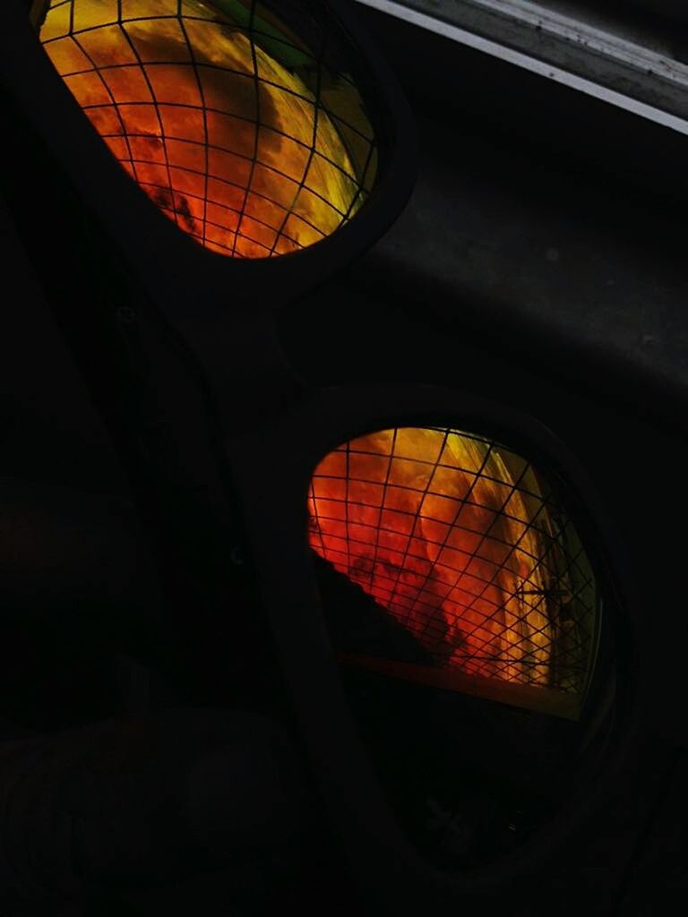 red, transportation, pattern, illuminated, no people, black background, hot air balloon, night, close-up, sky, outdoors