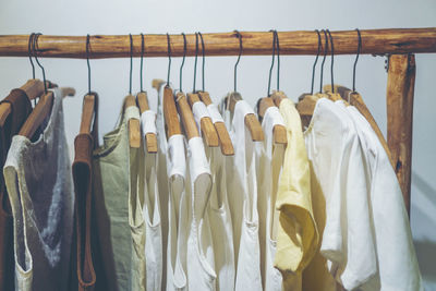 Row of clothes hanging on rack