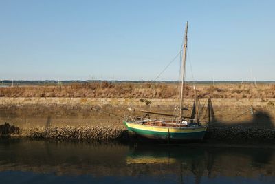 Boats moored in calm sea
