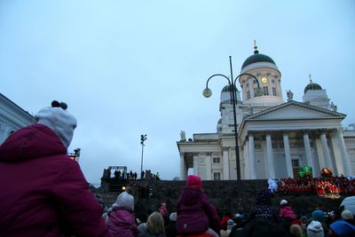 People in front of building