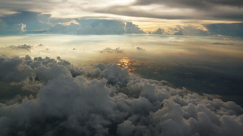 Aerial view of clouds in sky during sunset