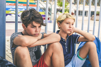 Portrait of young couple looking away