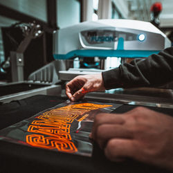 Close-up of man working on table