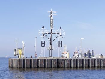 Commercial dock against clear sky