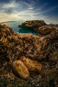 Shot in mellieha, malta. these two rocks look like two babies sheltering from the weather