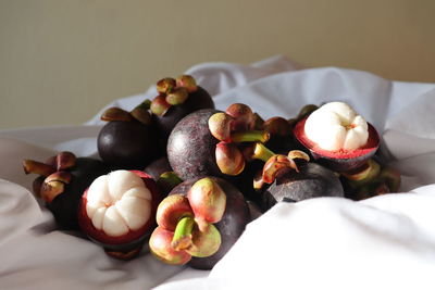 High angle view of fruits in plate on table