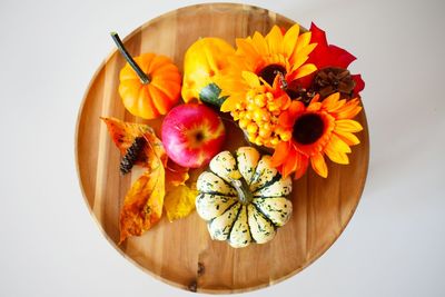 High angle view of orange flowers on table