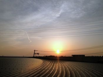 Scenic view of landscape at sunset