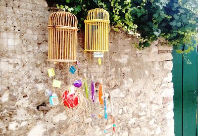 High angle view of multi colored umbrellas hanging on wall